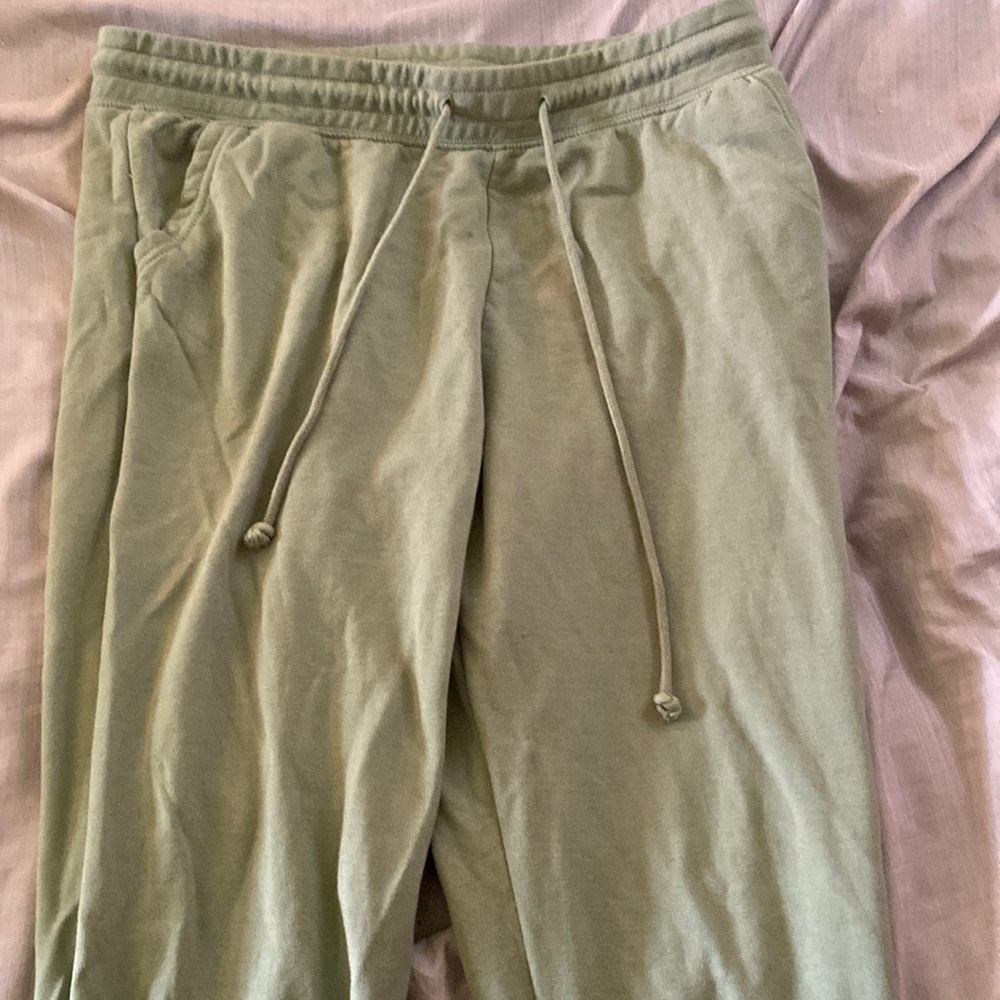 These are a large green sweatpants from just be…